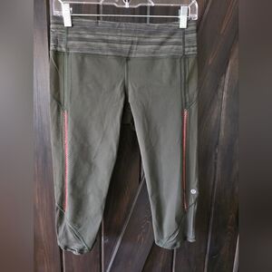 Lululemon Vintage Dark Green Cropped Leggings with Coral Stitching